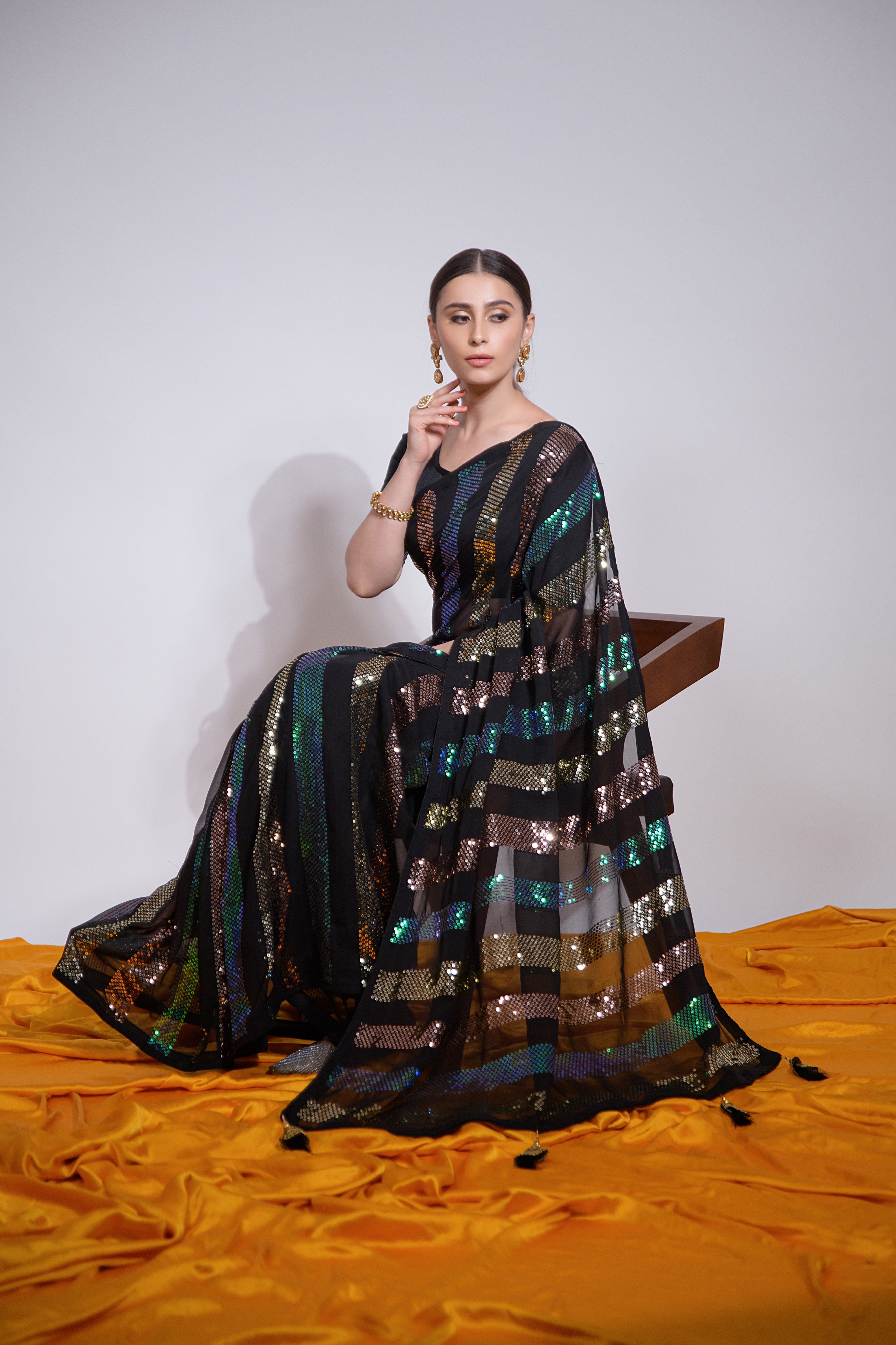 Beautiful Georgette Sequence Patta Black Solid Saree For Women