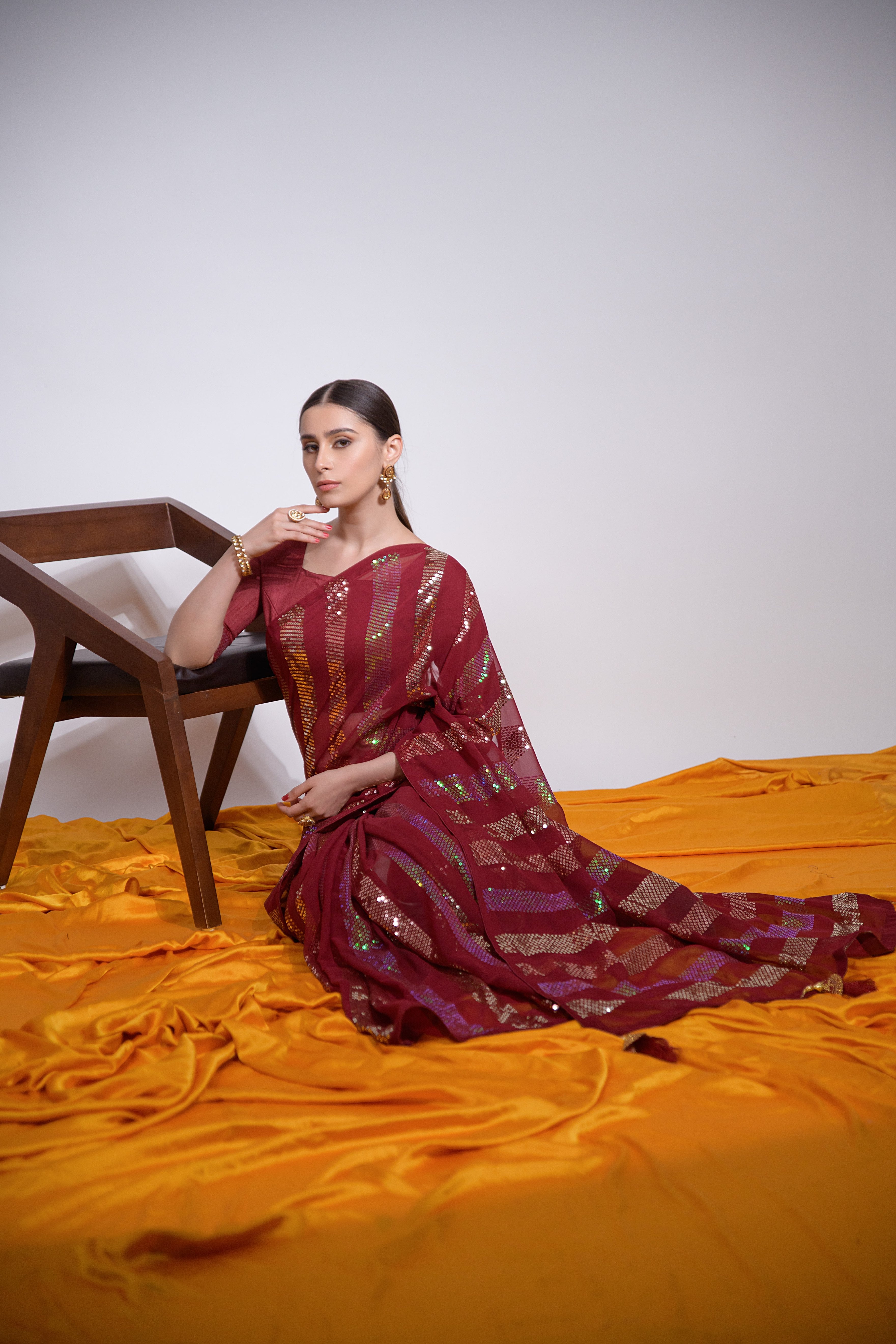 Beautiful Georgette Sequence Patta Maroon Solid Saree For Women